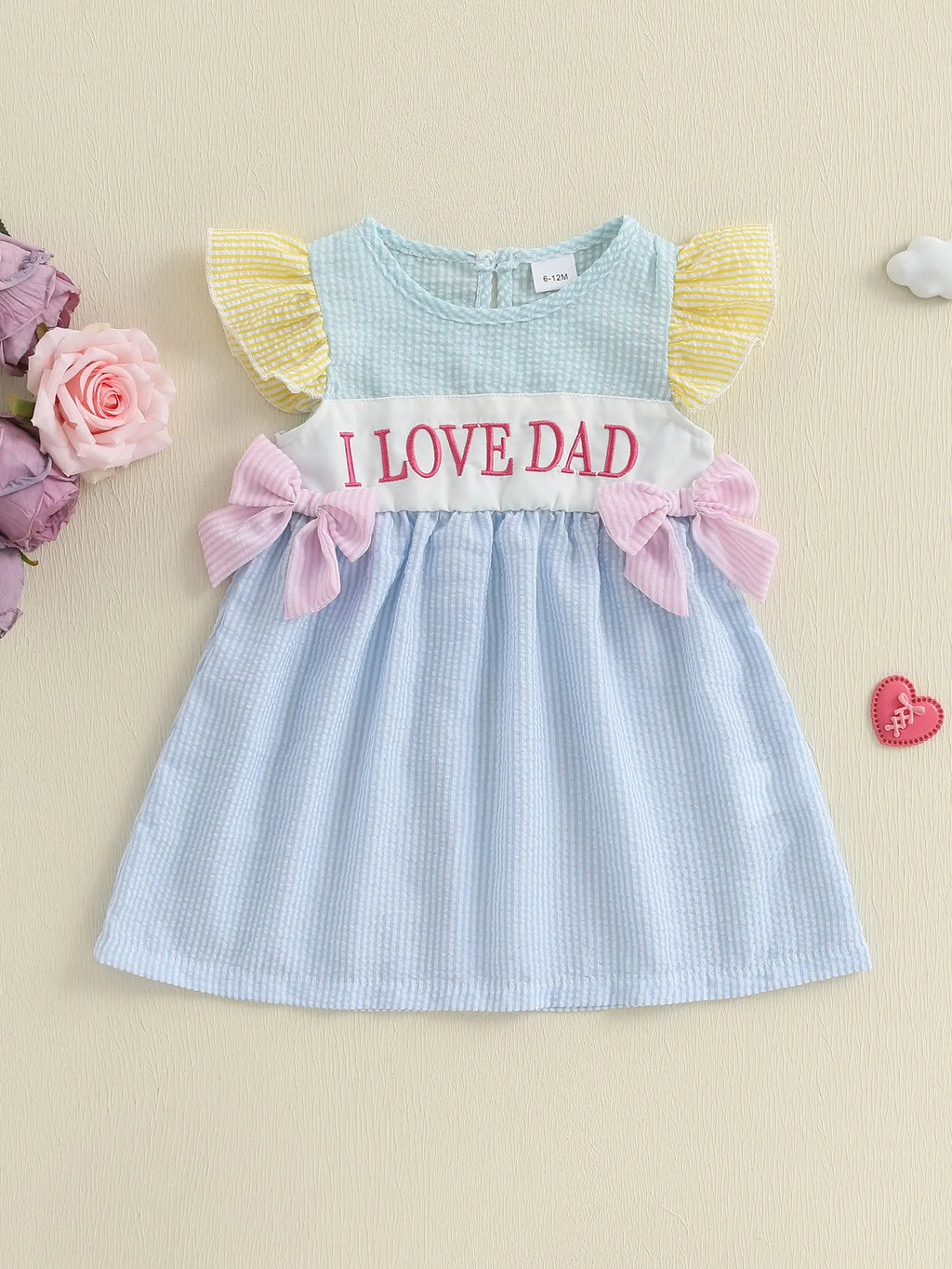Adorable Infant Girl Sleeveless Dress with Cute Bow Accents Embroidered Letters Striped Design and Ruffled Trim