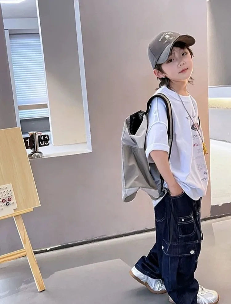 2025 New Boys' Solid Color Jeans - Loose Fit Straight Leg Kids' Long Pants with Pockets, Trendy & Stylish Denim for Active Boys