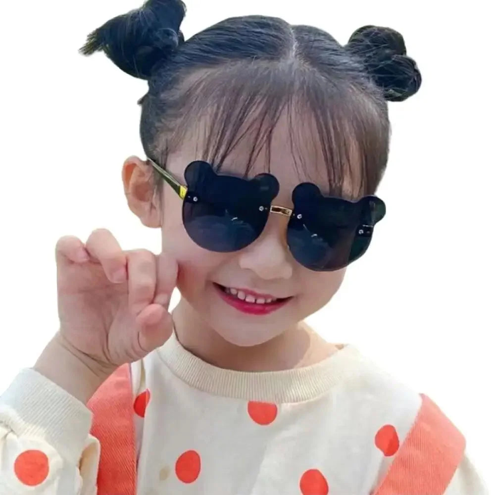 Boys and girls fashion glasses Children's sunglasses Cute baby anti-ultraviolet bear ears cartoon shape rimless frame glasses